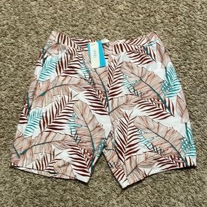Mens size L brand new never worn swim trunks.